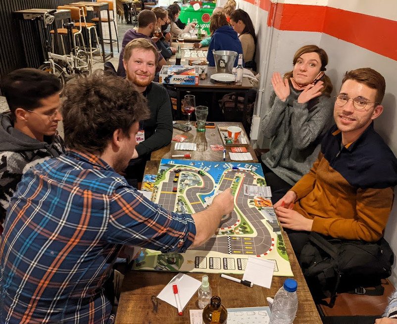 A photo of a group of people playing Downforce at the Valencia Board Games event in Valencia Spain